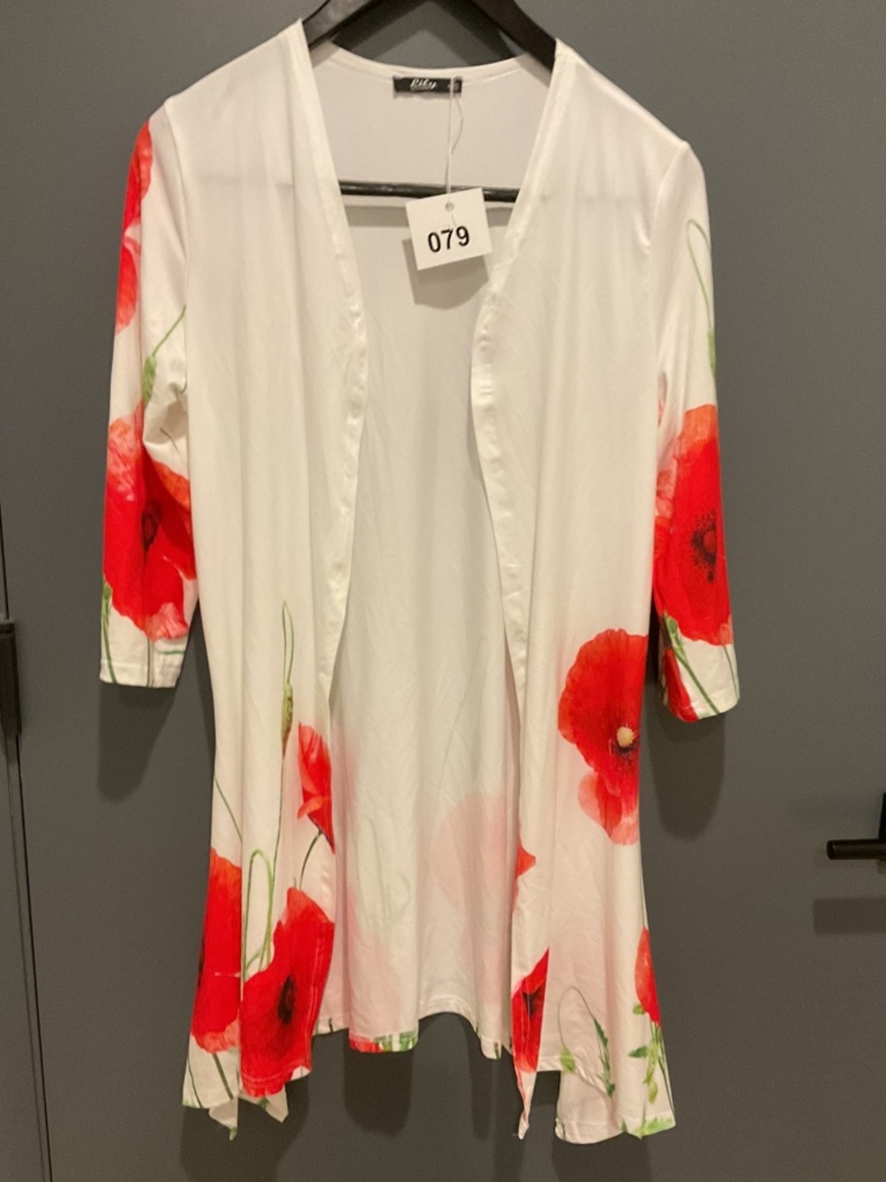 White cardigan with red poppy flowers